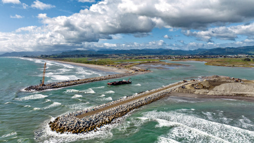 Low aerial view of Ōpōtiki harbour.